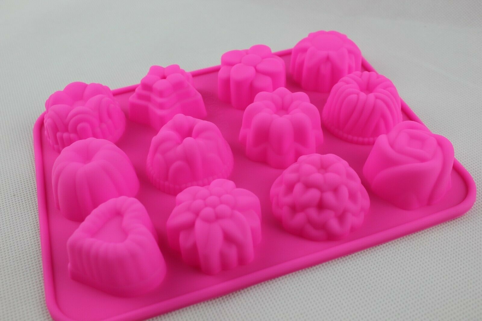 attachment-https://www.cupcakeaddicts.co.uk/wp-content/uploads/imported/3/Rose-Heart-Flower-x-12-Silicone-Cake-Chocolate-Wax-Melt-Soap-Resin-Mould-Candle-322527995583-3.jpg