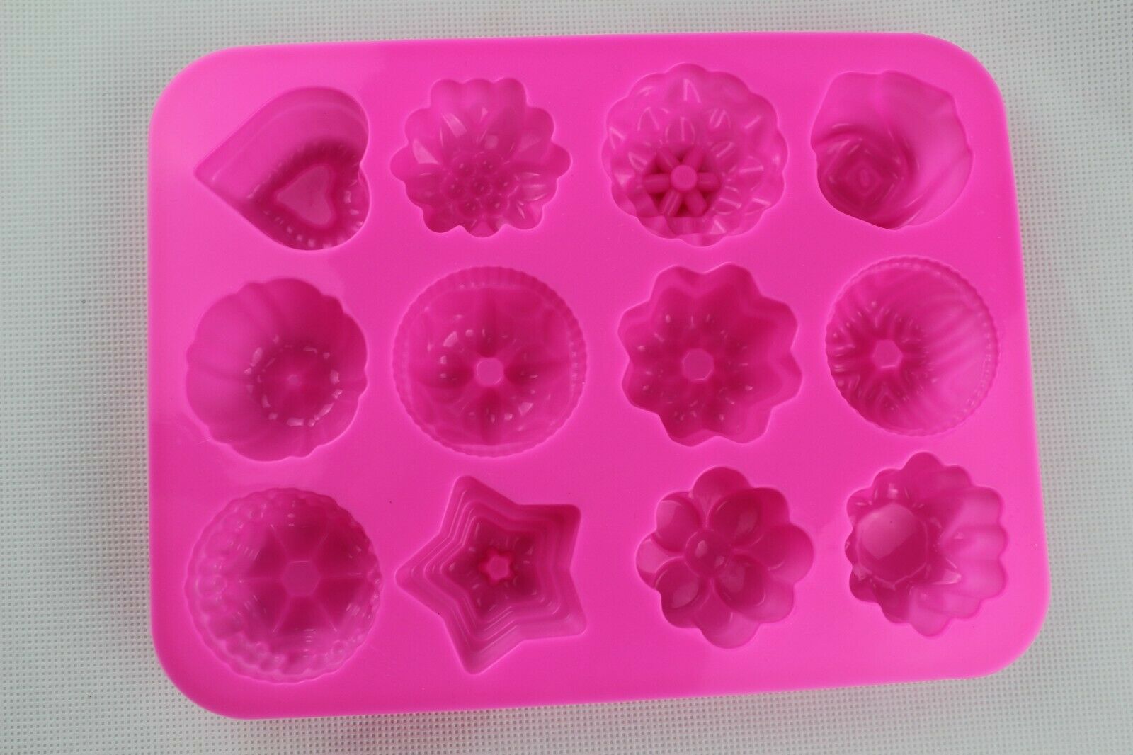attachment-https://www.cupcakeaddicts.co.uk/wp-content/uploads/imported/3/Rose-Heart-Flower-x-12-Silicone-Cake-Chocolate-Wax-Melt-Soap-Resin-Mould-Candle-322527995583-8.jpg