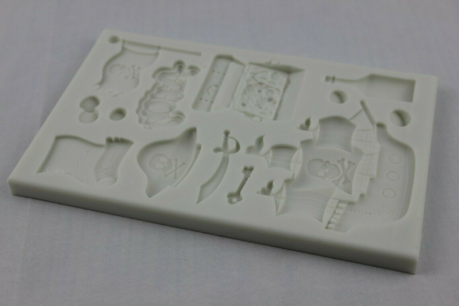 attachment-https://www.cupcakeaddicts.co.uk/wp-content/uploads/imported/4/Pirates-Treasure-Jolly-Roger-Galleon-silicone-mould-Resin-Icing-Fondant-Ice-Melt-324679589314-3.jpg