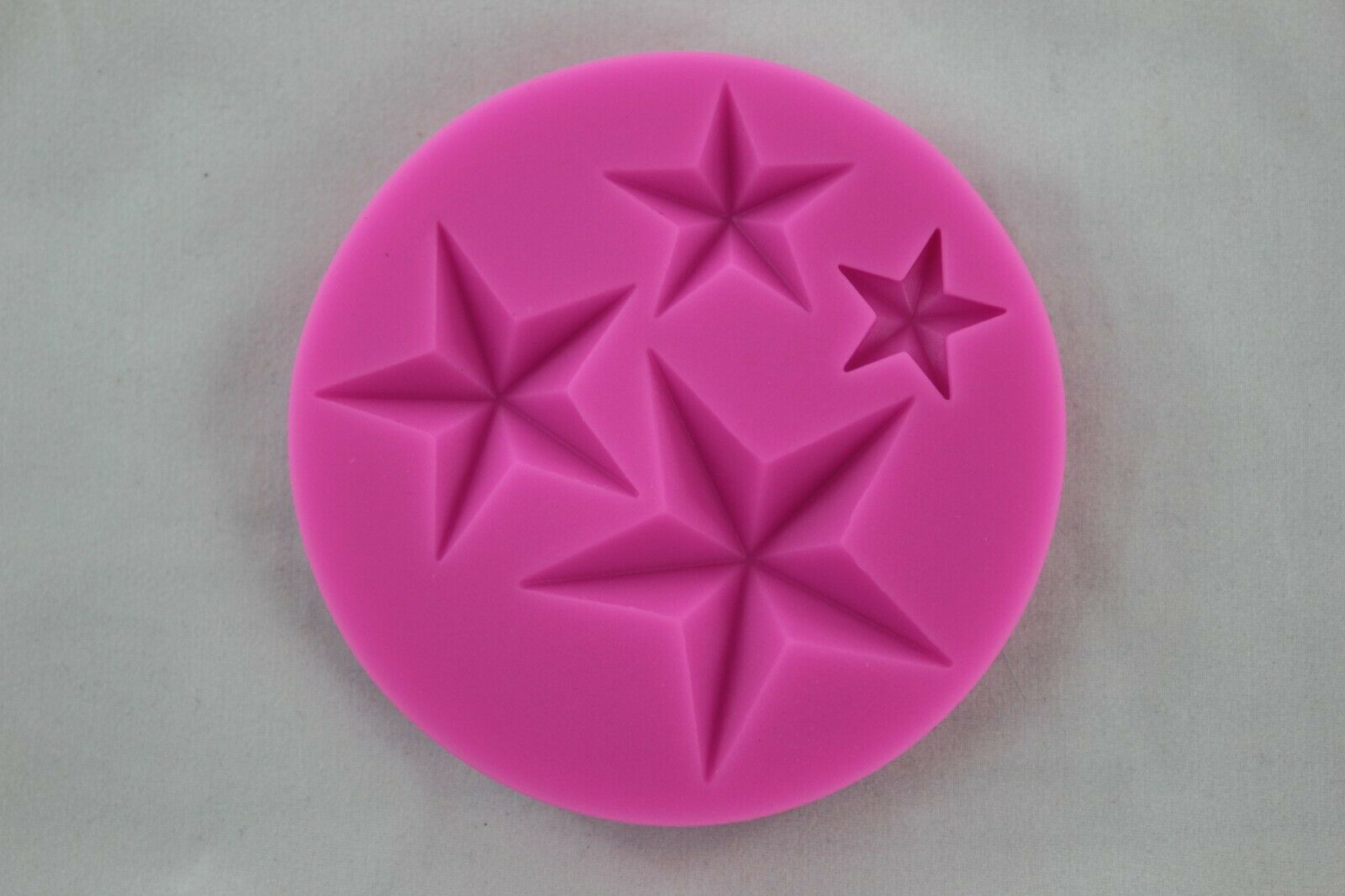 attachment-https://www.cupcakeaddicts.co.uk/wp-content/uploads/imported/5/Star-shapes-Silicone-mould-sugarcraft-baking-cake-decorating-fondant-chocolate-323779810625.jpg