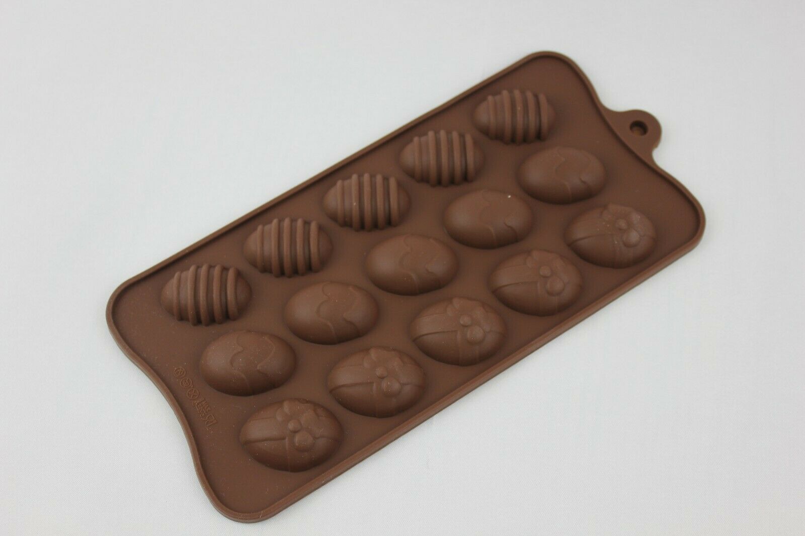 attachment-https://www.cupcakeaddicts.co.uk/wp-content/uploads/imported/7/Silicone-Easter-egg-15-cell-Chocolate-Mould-324445325657-3.jpg