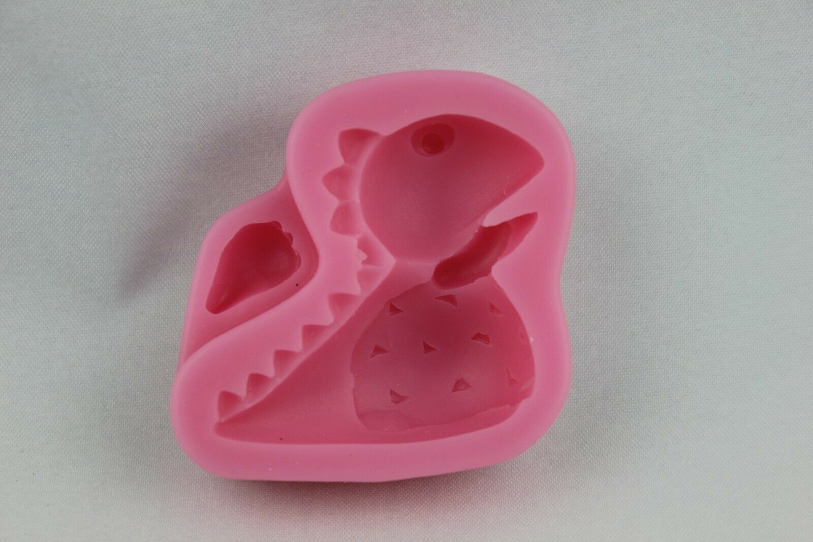 attachment-https://www.cupcakeaddicts.co.uk/wp-content/uploads/imported/7/Small-Dinosaur-Silicone-Mould-Icing-Cake-Decorating-Paste-Baking-Sugarcraft-3-324317404047-2.jpg