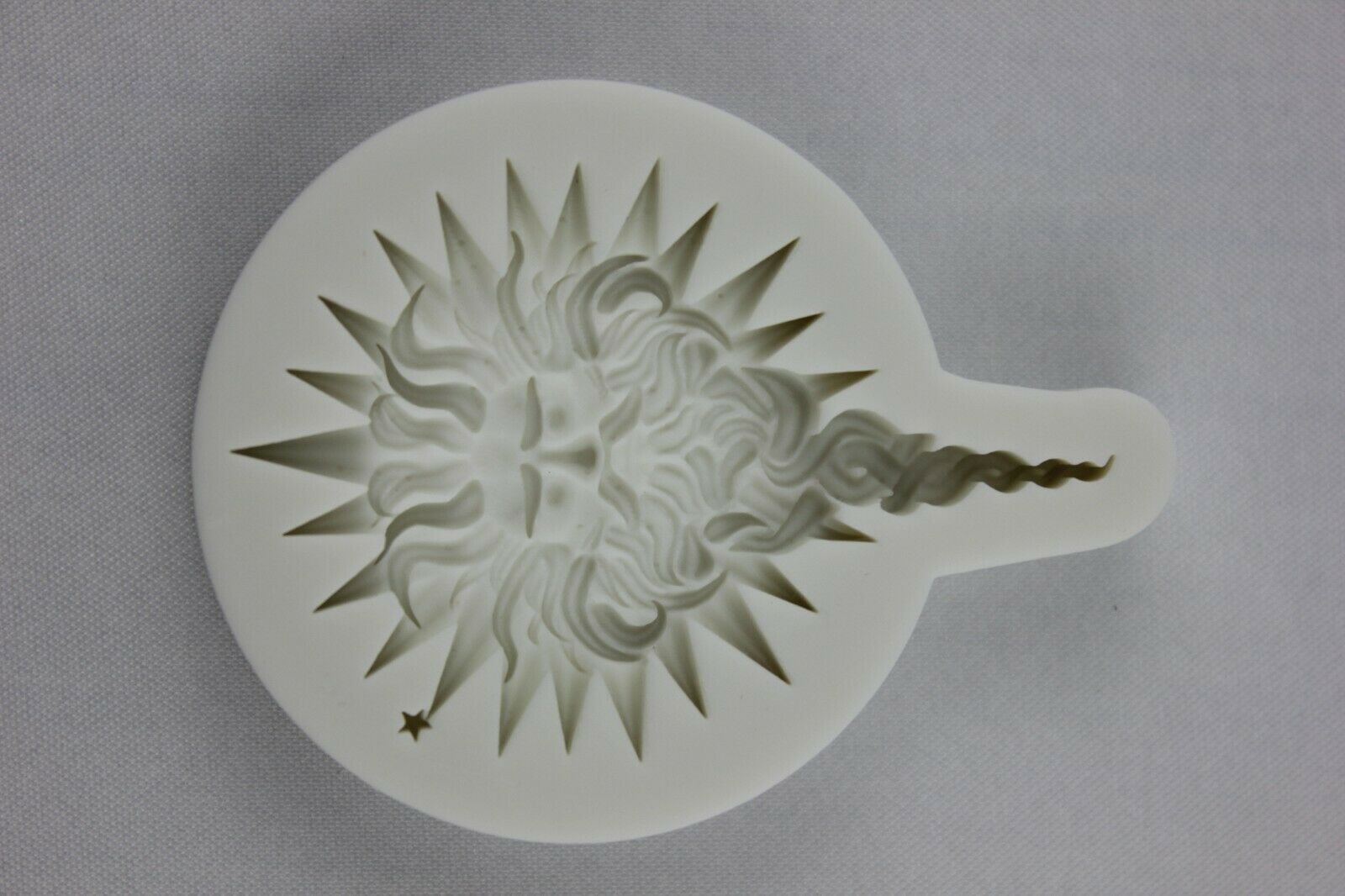 attachment-https://www.cupcakeaddicts.co.uk/wp-content/uploads/imported/7/Sun-God-Star-Face-Silicone-mould-324646753557-3.jpg