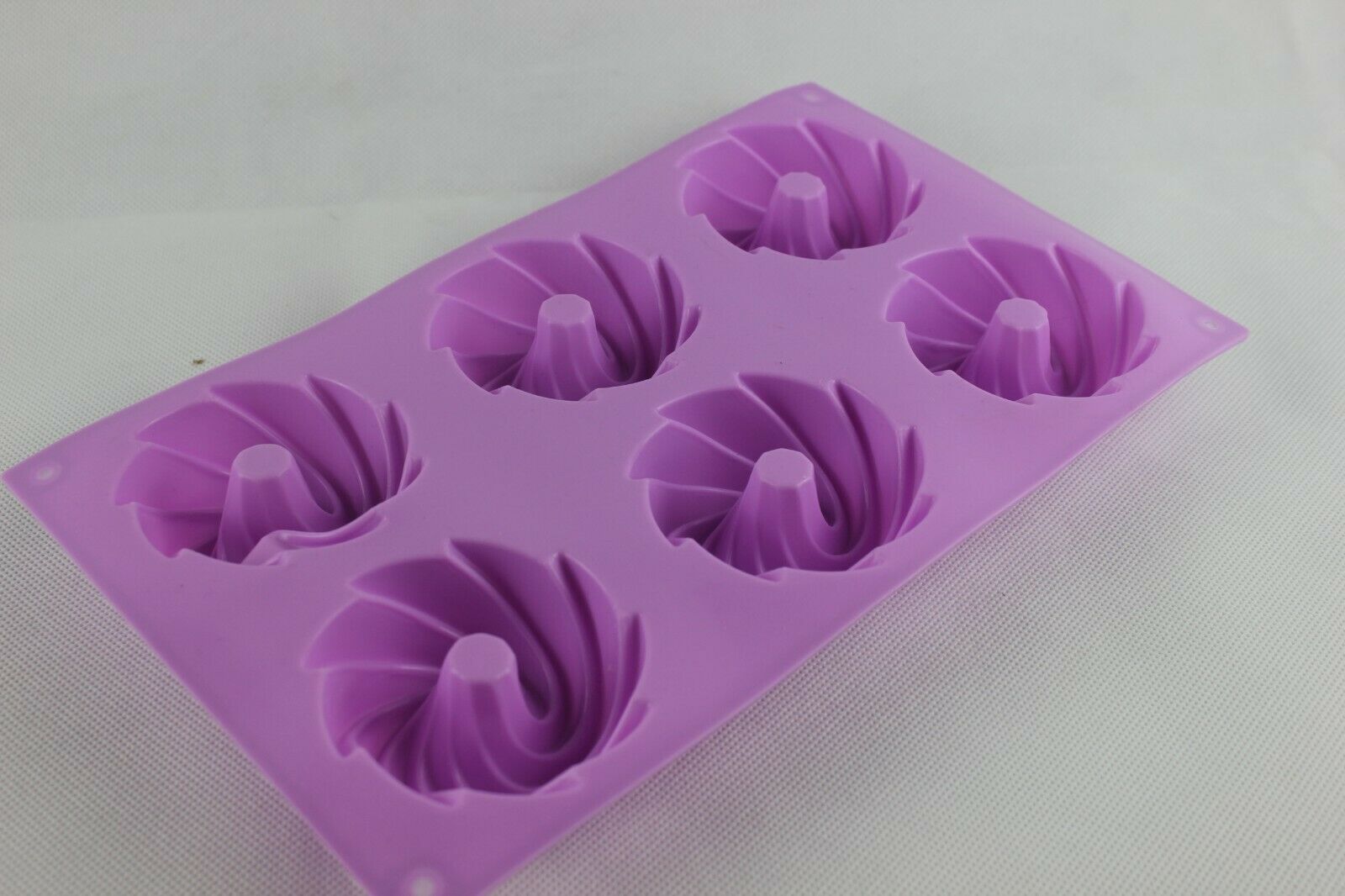 attachment-https://www.cupcakeaddicts.co.uk/wp-content/uploads/imported/7/Swirls-bunt-muffin-mould-6-cavity-soap-candle-sugarcraft-cake-cupcake-baking-323825444367-2.jpg