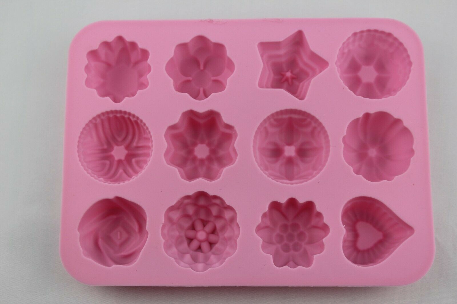 attachment-https://www.cupcakeaddicts.co.uk/wp-content/uploads/imported/8/12-Cell-Silicone-Various-Flowers-Star-Heart-Bunt-mould-Cake-Wax-Candle-Soap-324311985848-6.jpg
