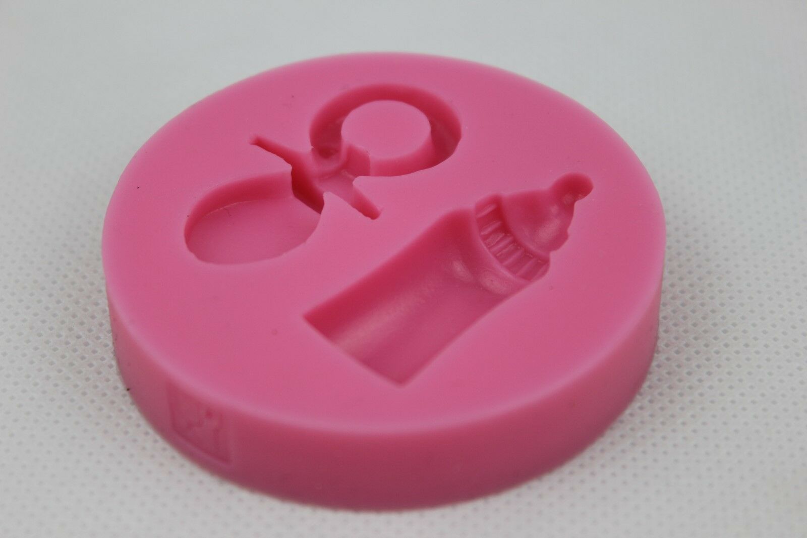attachment-https://www.cupcakeaddicts.co.uk/wp-content/uploads/imported/9/Baby-Bottle-Dummy-Soother-Silicone-Mould-Baby-Shower-Christening-Cake-Icing-323145306799-4.jpg