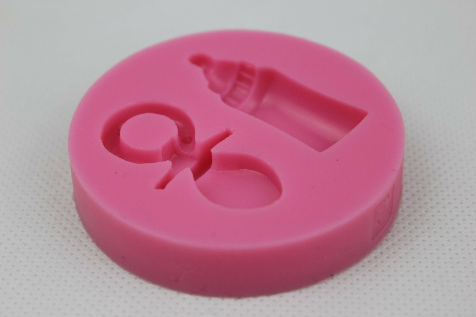 attachment-https://www.cupcakeaddicts.co.uk/wp-content/uploads/imported/9/Baby-Bottle-Dummy-Soother-Silicone-Mould-Baby-Shower-Christening-Cake-Icing-323145306799-5.jpg
