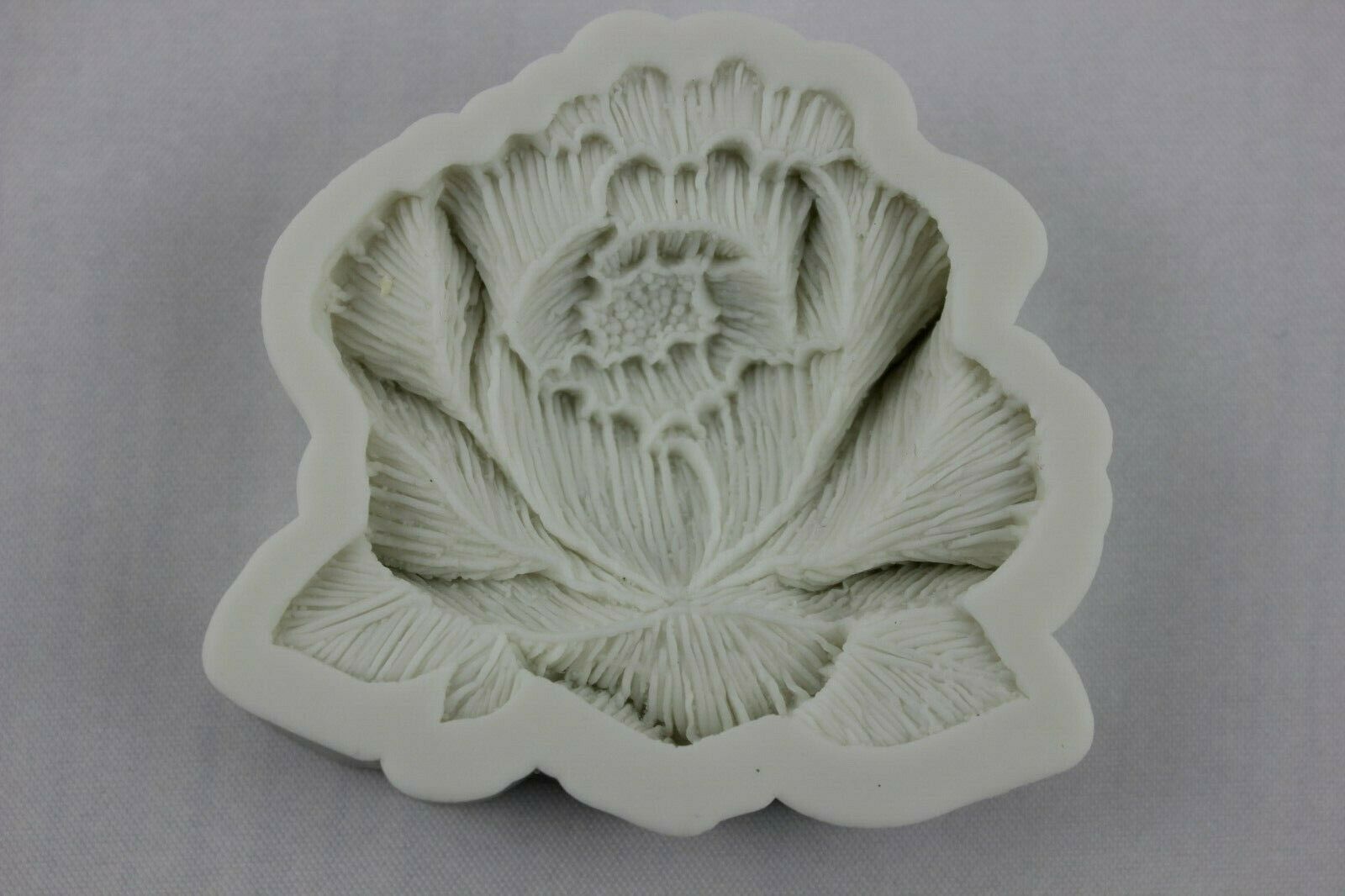 attachment-https://www.cupcakeaddicts.co.uk/wp-content/uploads/imported/9/Large-Flower-silicone-mould-Resin-Icing-Fondant-Ice-Soap-Sugar-Craft-Melt-4-324684415989.jpg