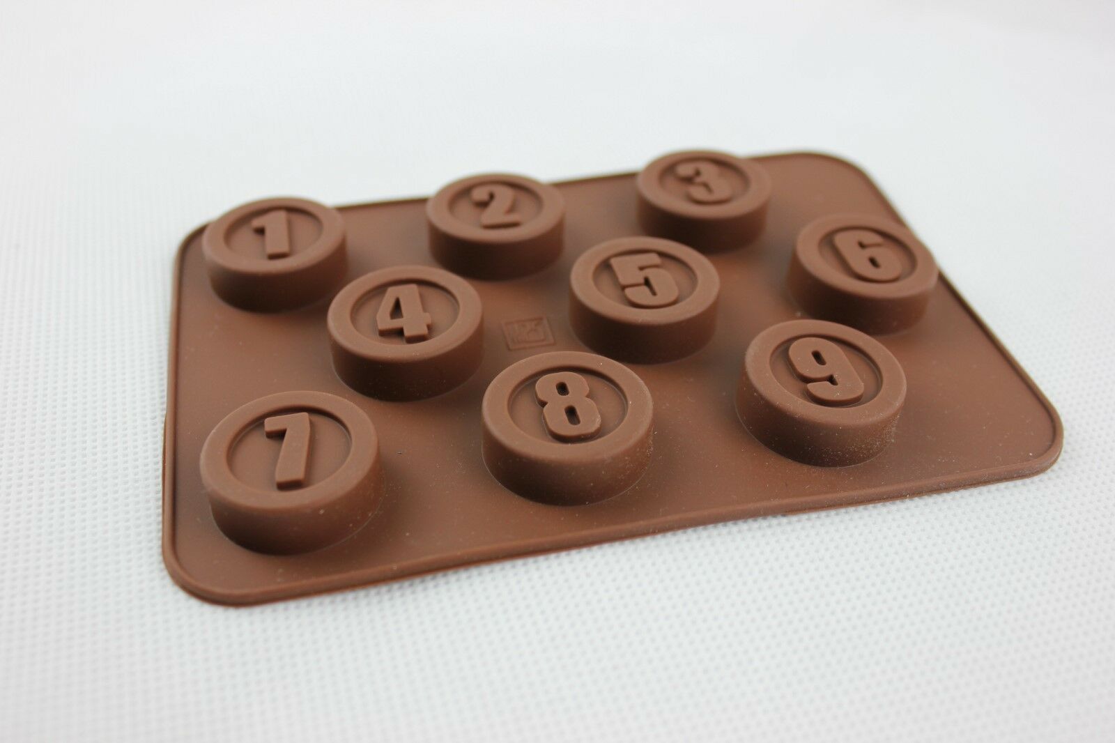 attachment-https://www.cupcakeaddicts.co.uk/wp-content/uploads/imported/9/Round-Numbers-Silicone-Chocolate-Mould-9-Cell-Jelly-Ice-Cube-Soap-Candle-Tray-323363300939-2.jpg